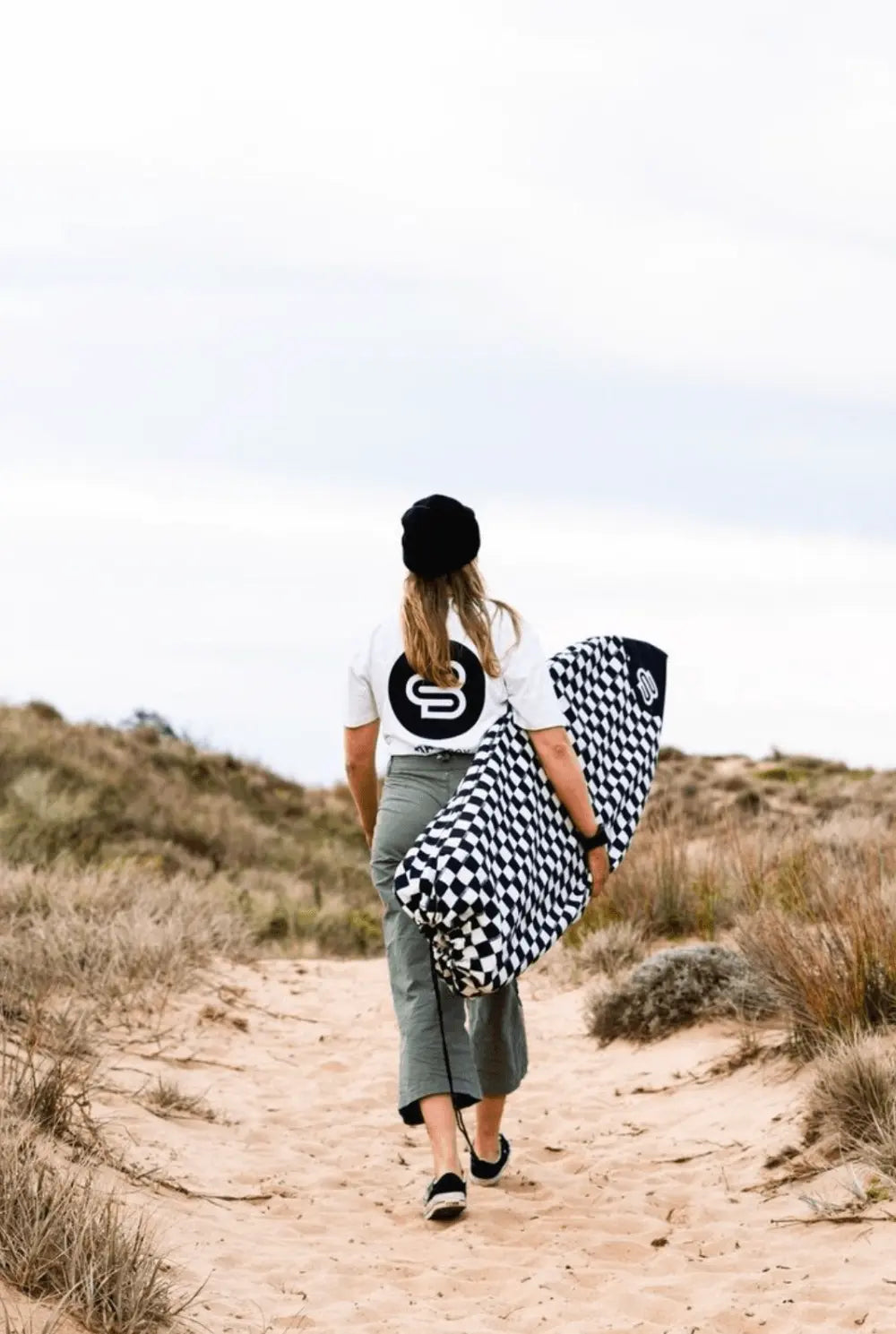 Checks canvas surfboard cover, keeps wax out of your car