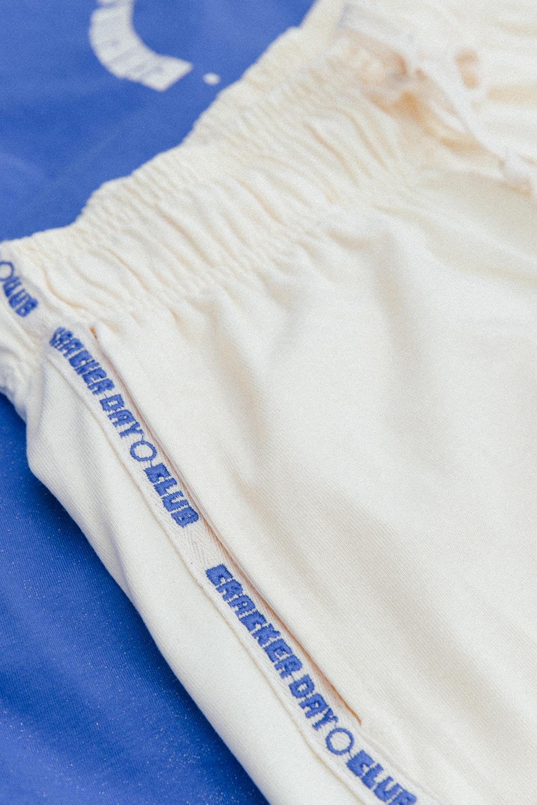 the racer club cotton shorts by cracker day club with featured emnroidery