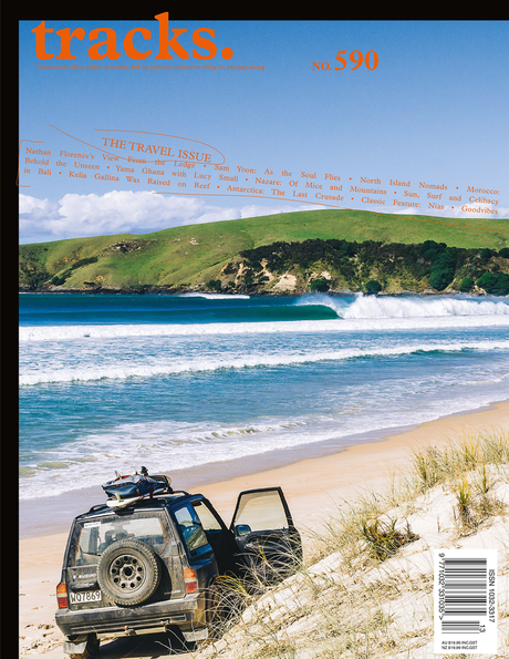 Cover of 'tracks.' magazine issue 590, featuring a travel edition with an image of a beach and a vehicle on sand dunes.