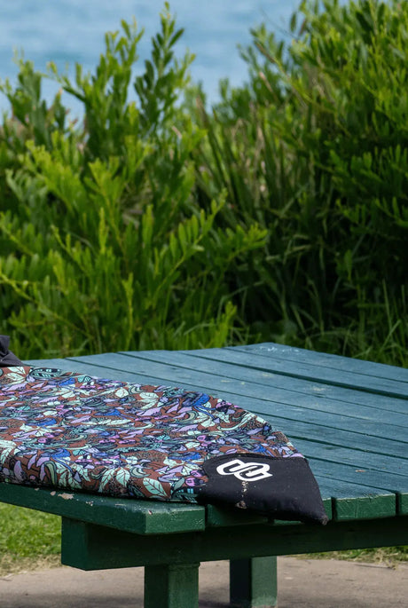 Fantastic Fungi shortboard cover with drawstring closure drawn snug