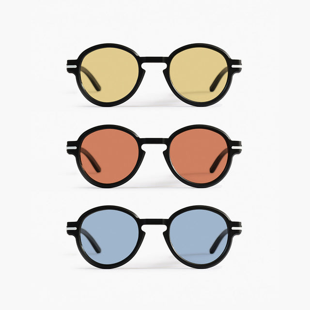 Close-up of Good Citizens' range of round frames with colored lenses on a white background, highlighting the stylish, eco-friendly design, modular design, and 100% recycled plastic frames made in Australia