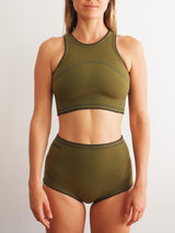 focus on the front of the green surf shorts for women