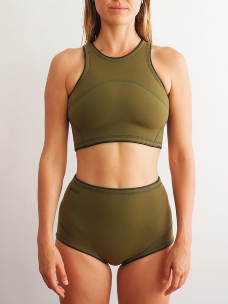 focus on the front of the green surf shorts for women